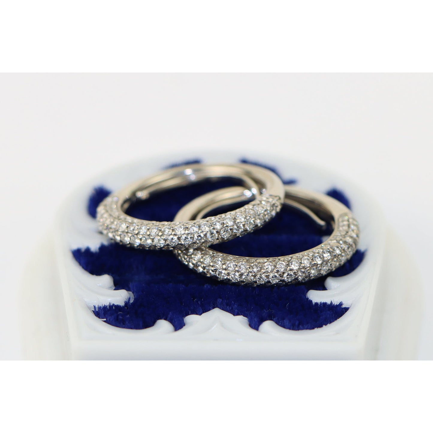 A Pair of 18k Gold Pave Set Diamond Rings Stamped U.J.D.C