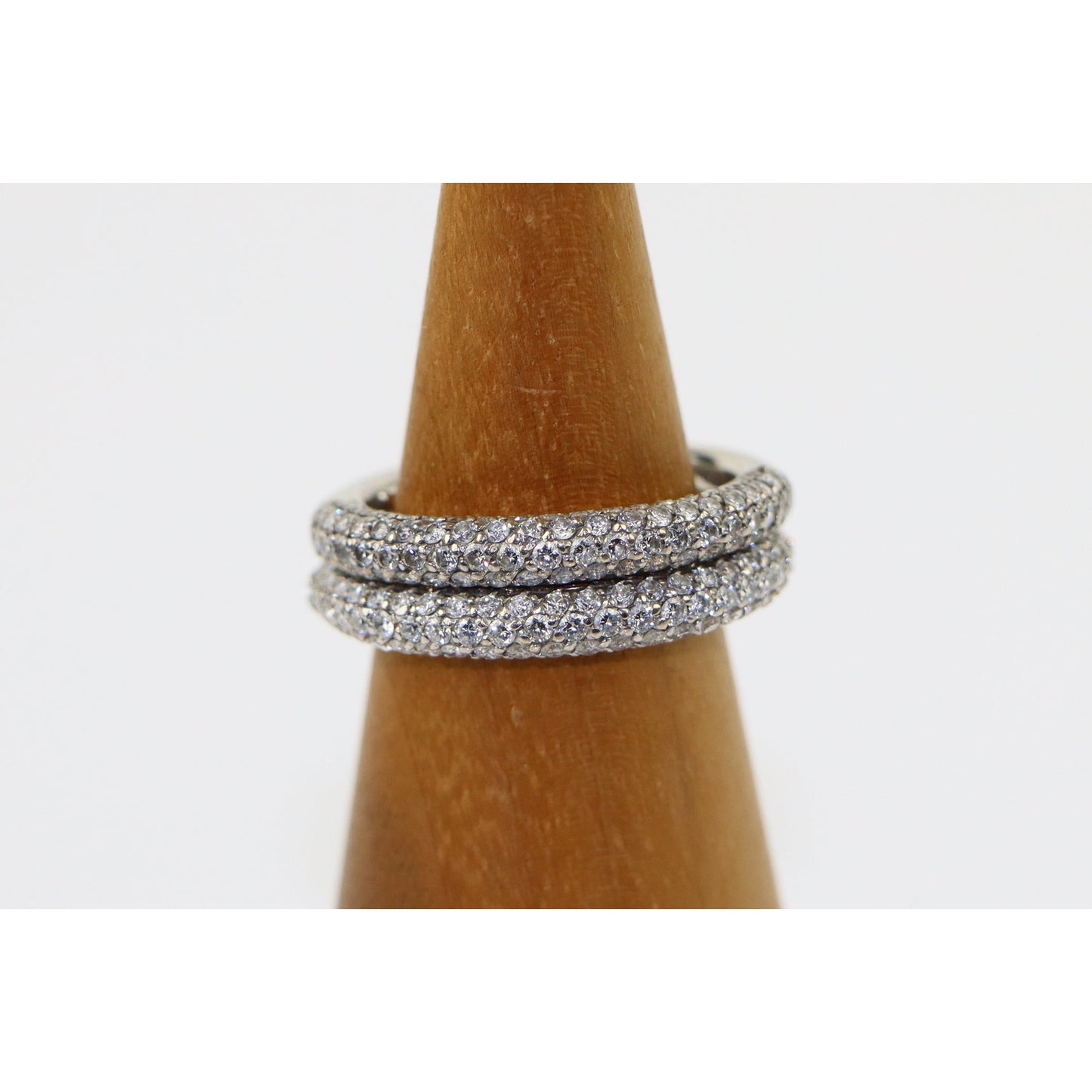 A Pair of 18k Gold Pave Set Diamond Rings Stamped U.J.D.C