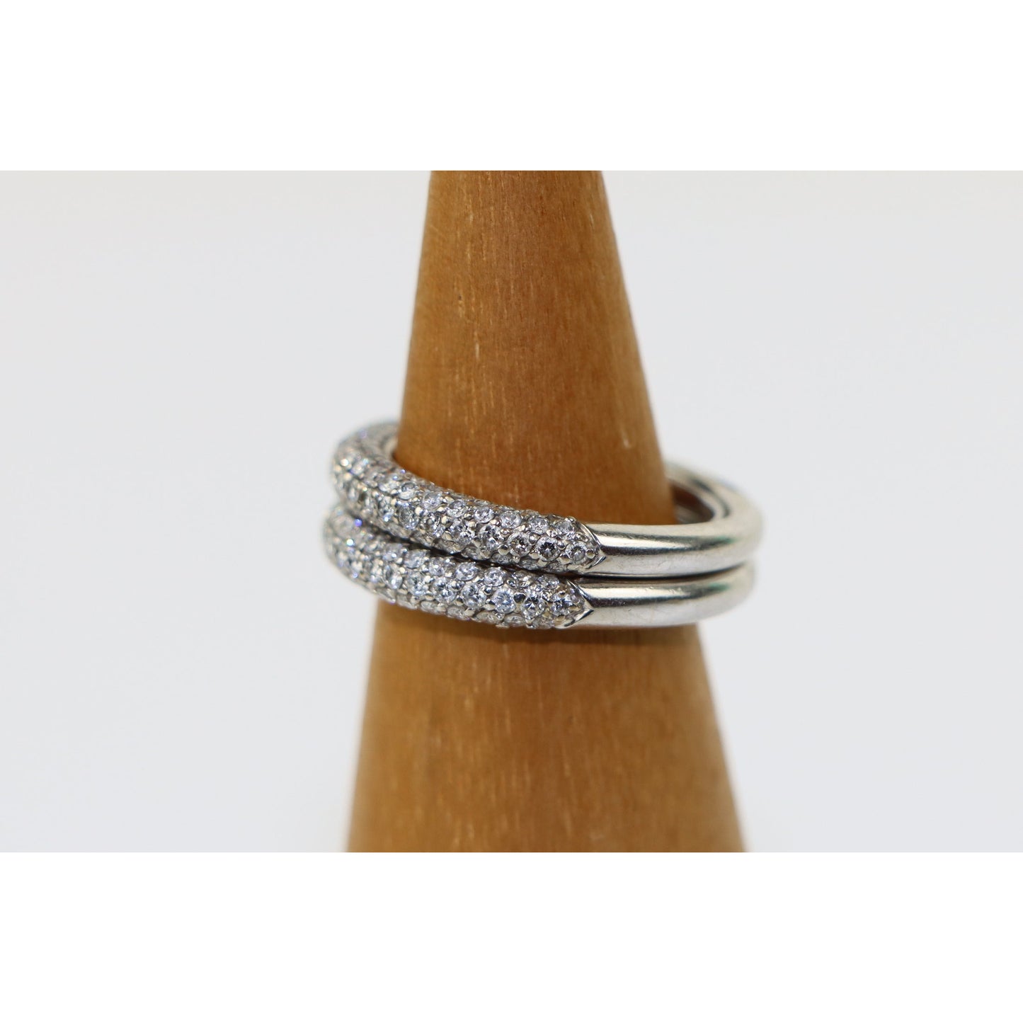 A Pair of 18k Gold Pave Set Diamond Rings Stamped U.J.D.C