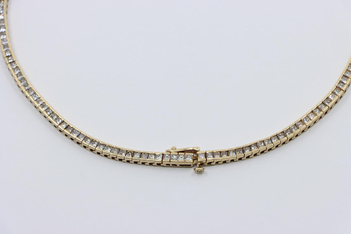 A Pair of Vintage 14K Gold Diamond Bracelets