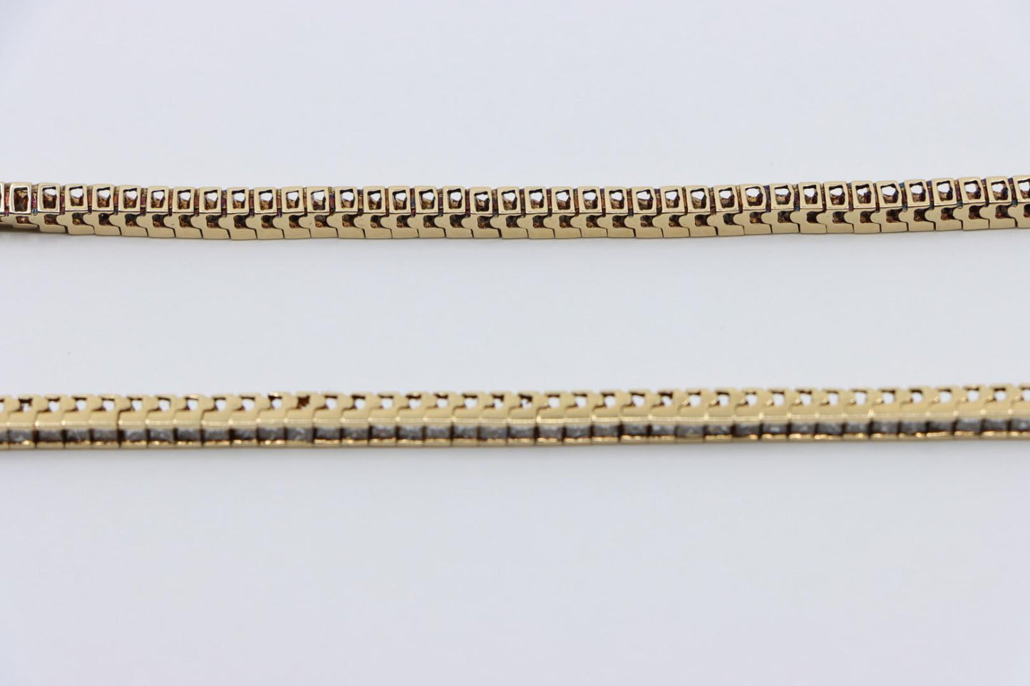 A Pair of Vintage 14K Gold Diamond Bracelets