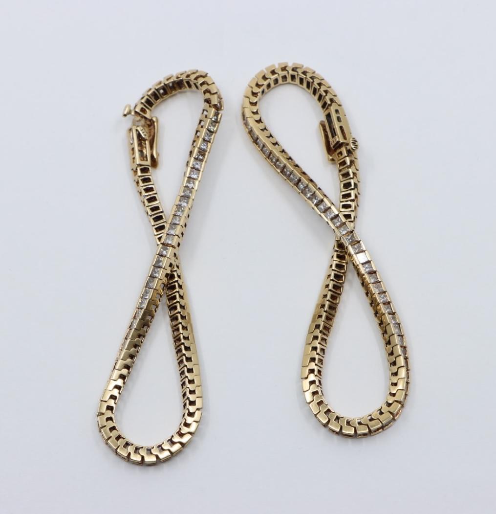 A Pair of Vintage 14K Gold Diamond Bracelets