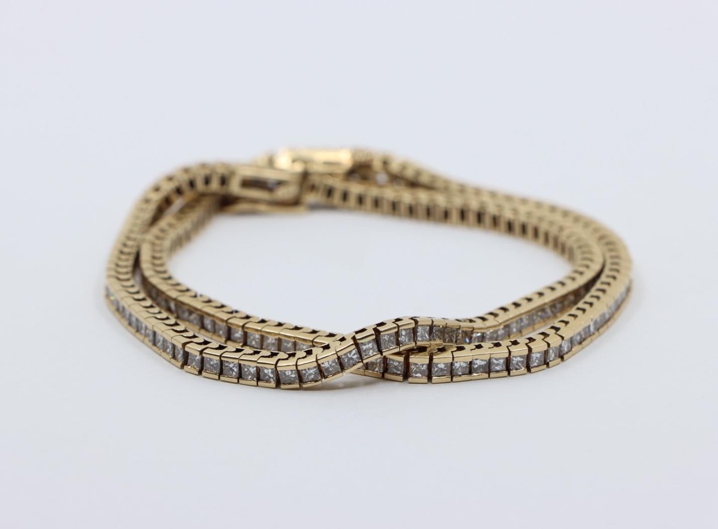 A Pair of Vintage 14K Gold Diamond Bracelets