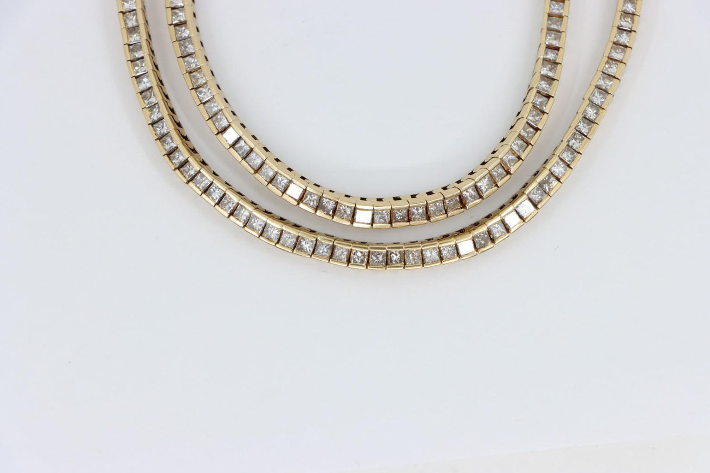 A Pair of Vintage 14K Gold Diamond Bracelets