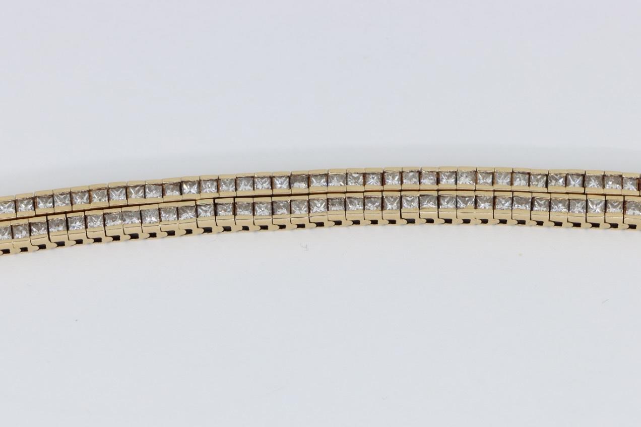 A Pair of Vintage 14K Gold Diamond Bracelets