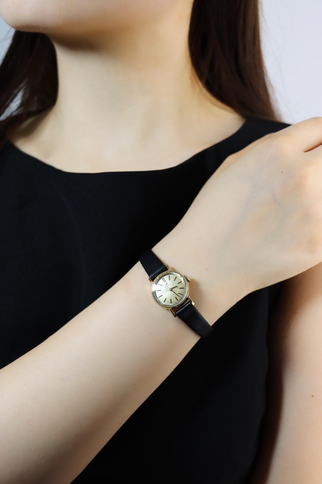 Vintage Omega Gold Tone Black Leather Lady Watch