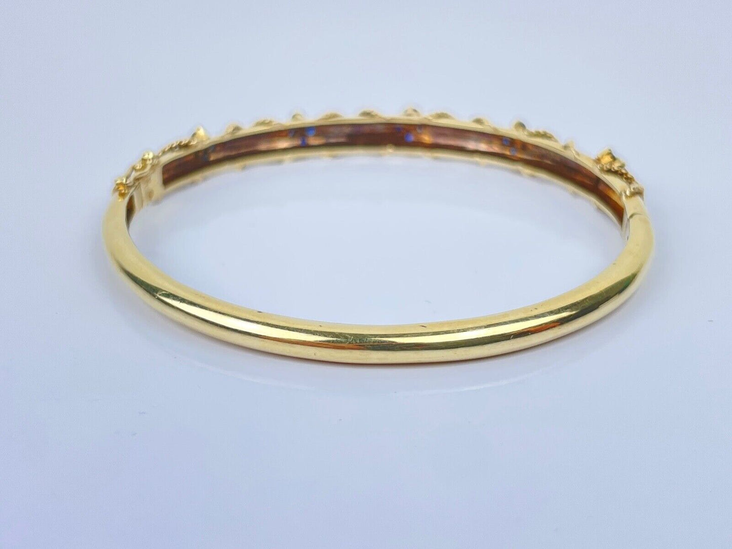 A Vintage 14K Gold Sapphire Diamond Bangle