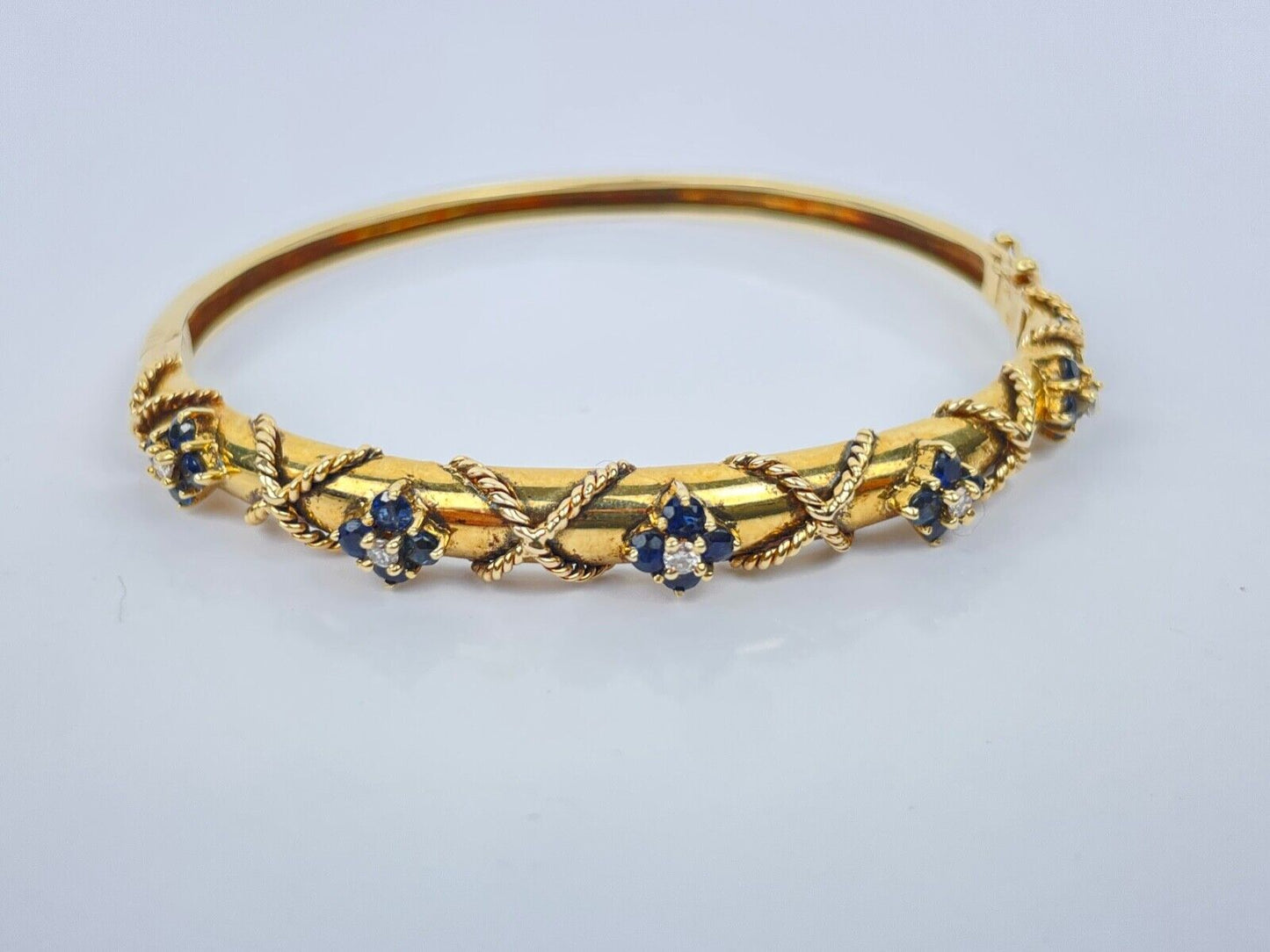A Vintage 14K Gold Sapphire Diamond Bangle