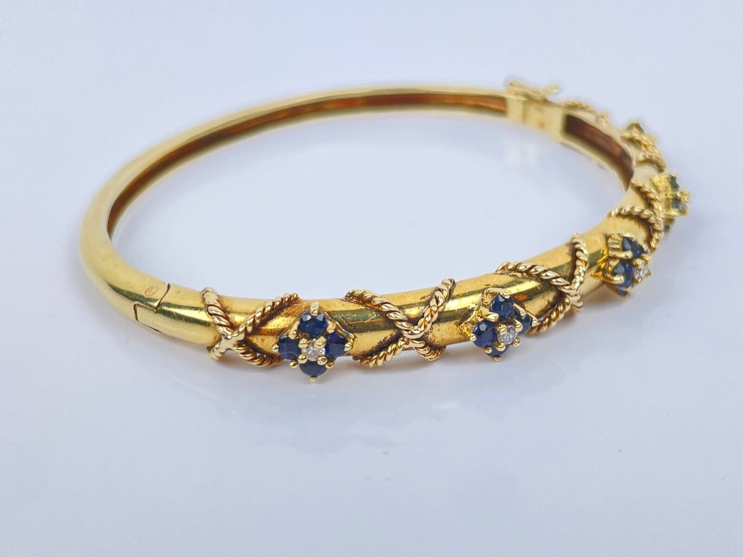 A Vintage 14K Gold Sapphire Diamond Bangle