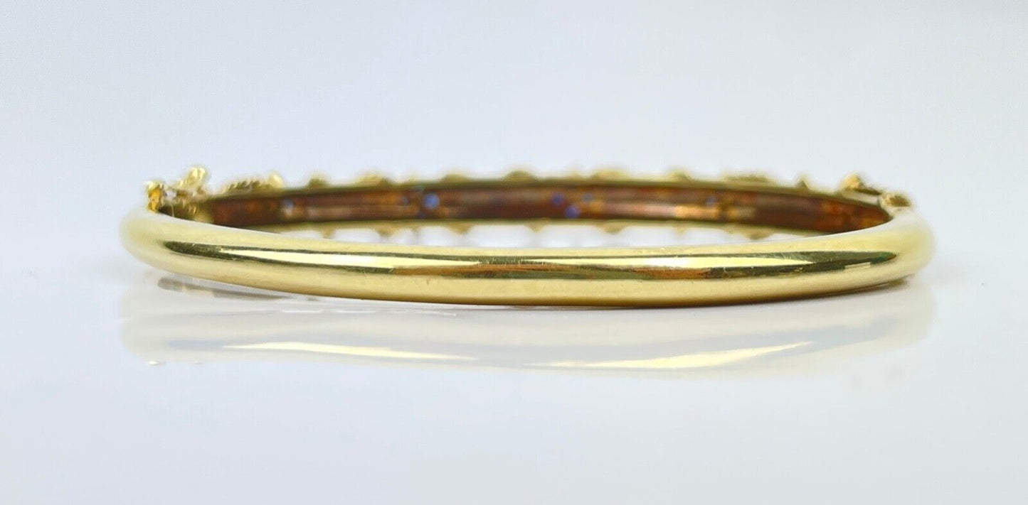 A Vintage 14K Gold Sapphire Diamond Bangle