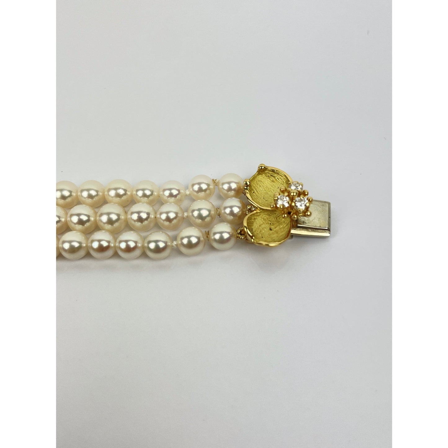 Tiffany & Co. Classic Collection 18k Gold Diamond Pearl Strand Bracelet
