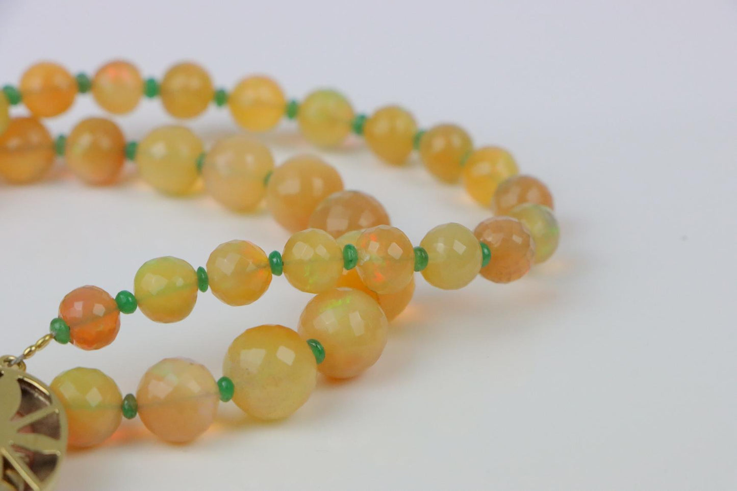 A 14K Gold Opal Emerald and Coral Bead Necklace