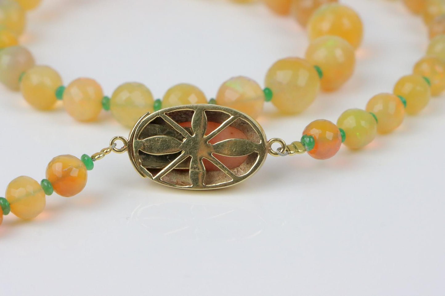 A 14K Gold Opal Emerald and Coral Bead Necklace