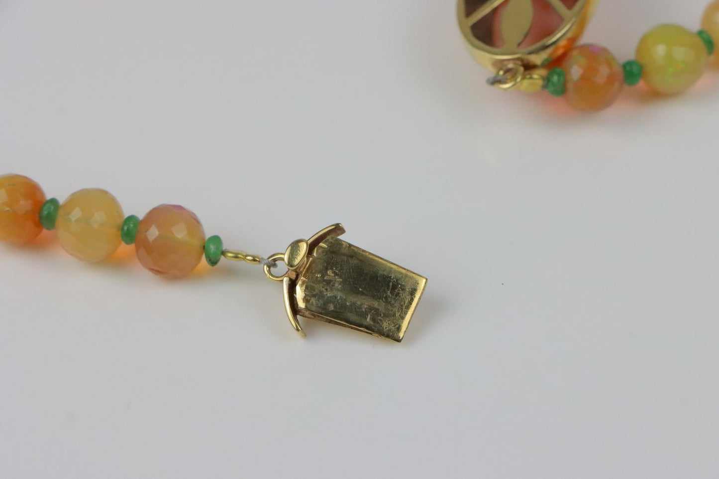 A 14K Gold Opal Emerald and Coral Bead Necklace