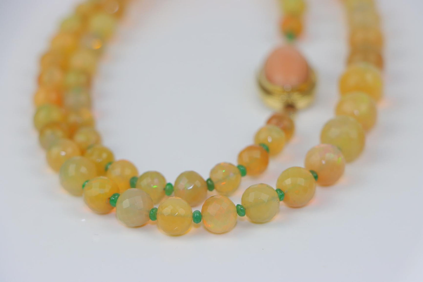 A 14K Gold Opal Emerald and Coral Bead Necklace