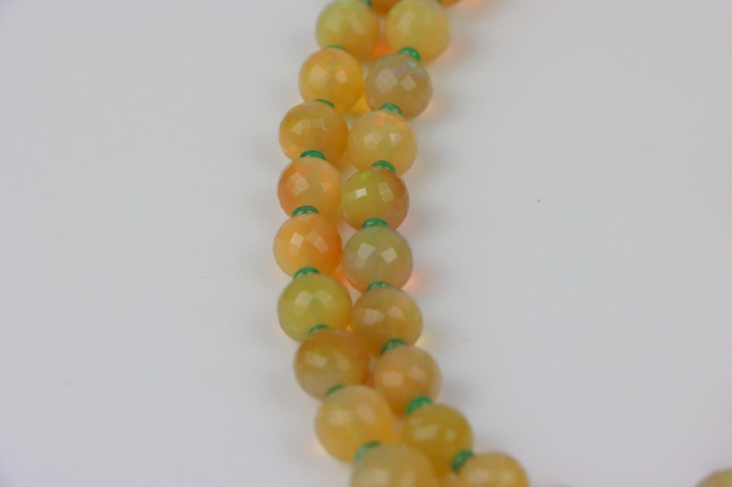 A 14K Gold Opal Emerald and Coral Bead Necklace