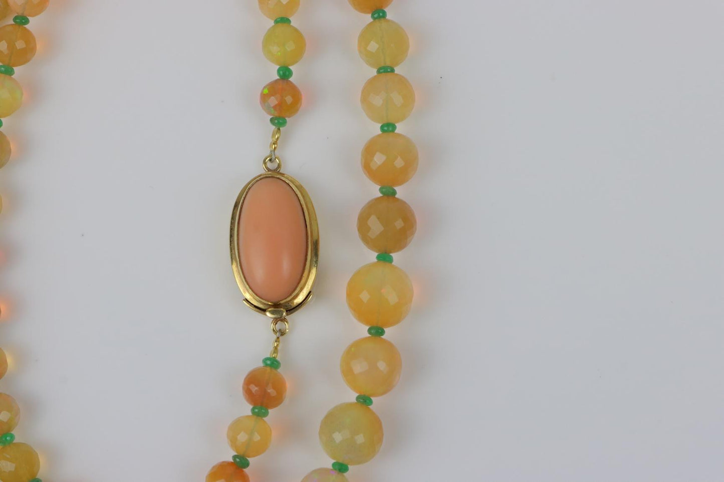 A 14K Gold Opal Emerald and Coral Bead Necklace