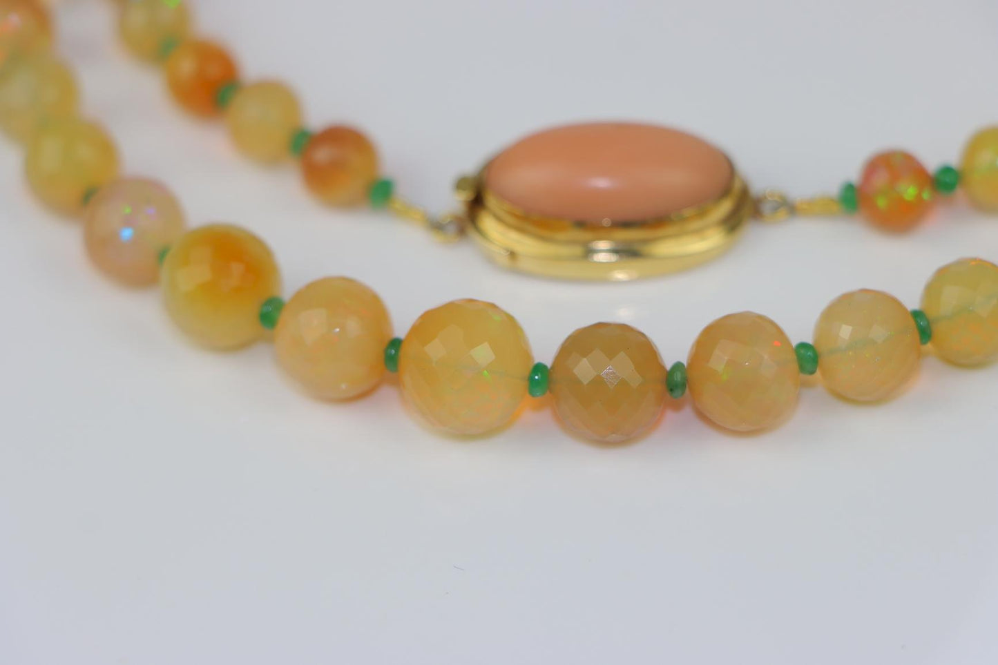 A 14K Gold Opal Emerald and Coral Bead Necklace