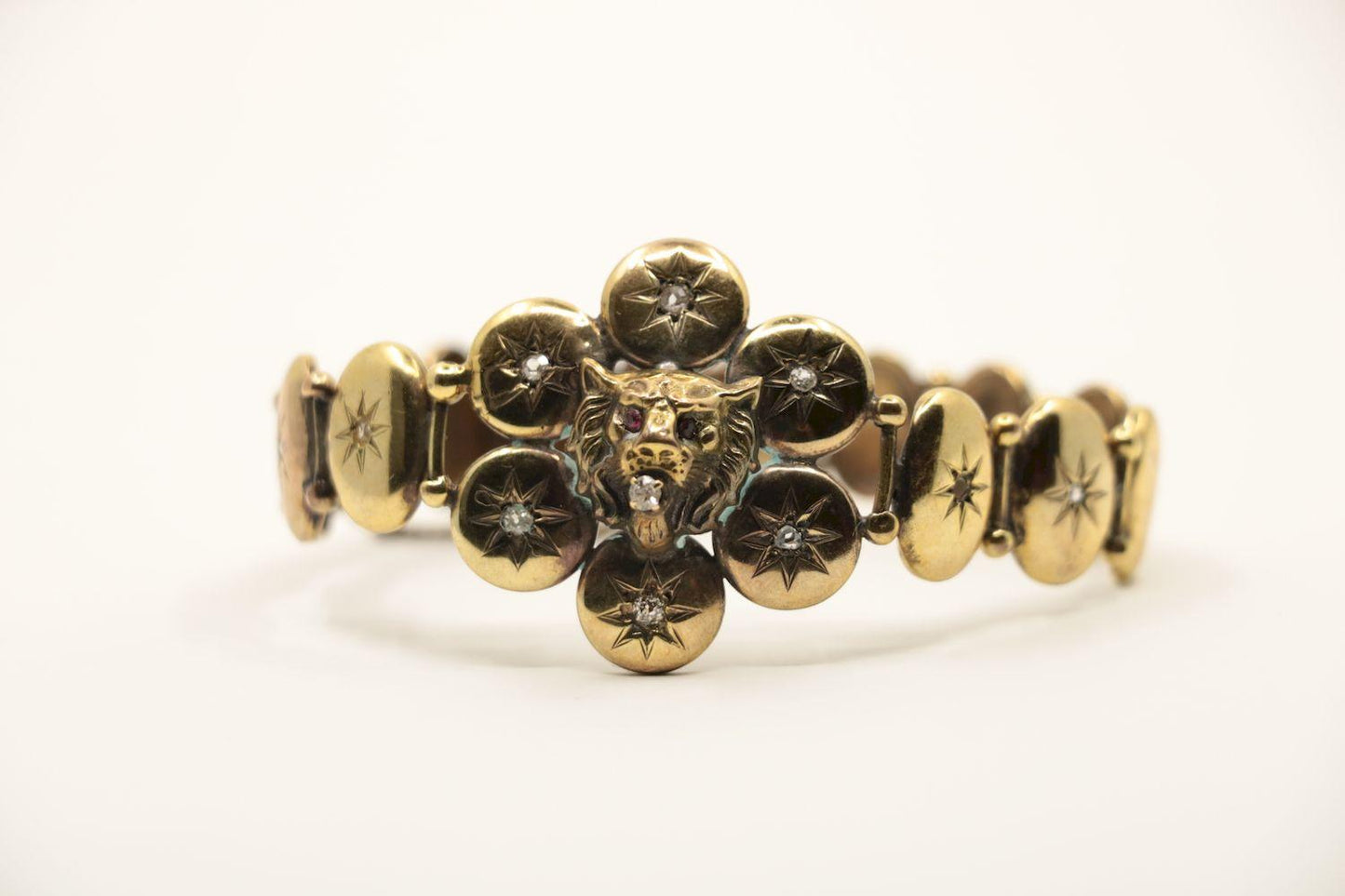 A Victorian 9K Gold Diamond Lion Head Bracelet