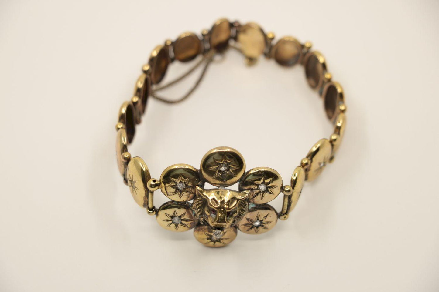 A Victorian 9K Gold Diamond Lion Head Bracelet