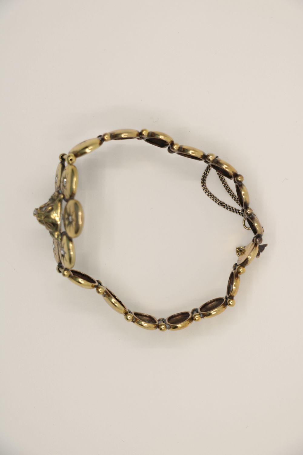 A Victorian 9K Gold Diamond Lion Head Bracelet