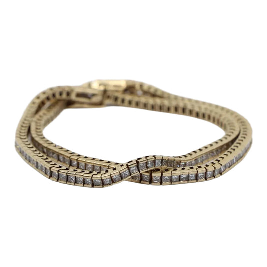 A Pair of Vintage 14K Gold Diamond Bracelets