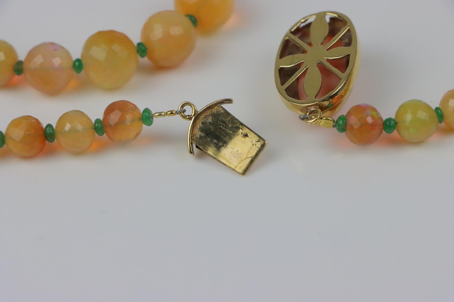 A 14K Gold Opal Emerald and Coral Bead Necklace